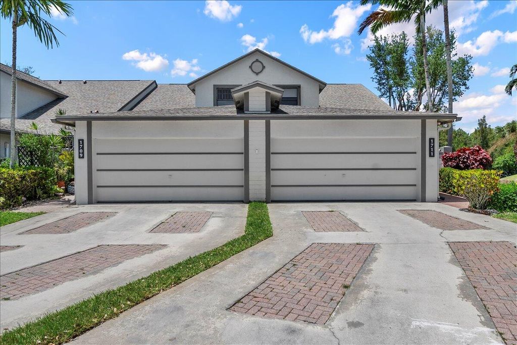 Photo of 1711 Landings Boulevard, Greenacres, FL 33413 (MLS # B26020313)