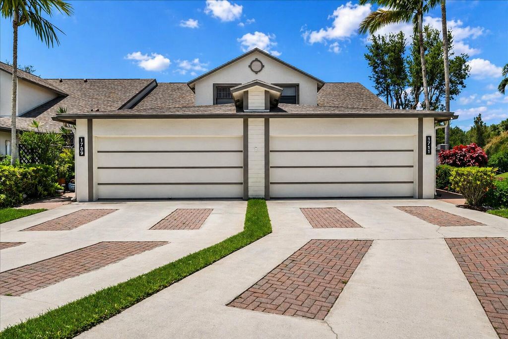 Photo of 1711 Landings Boulevard, Greenacres, FL 33413 (MLS # B26020313)