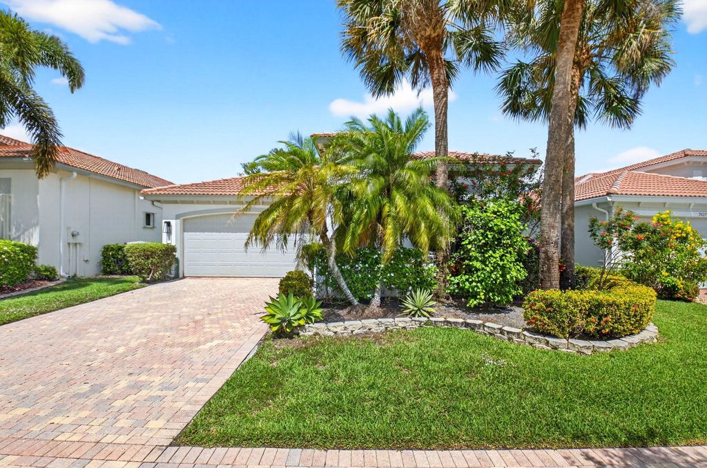 Photo of 9613 Isles Cay Drive, Delray Beach, FL 33446 (MLS # B26001959)
