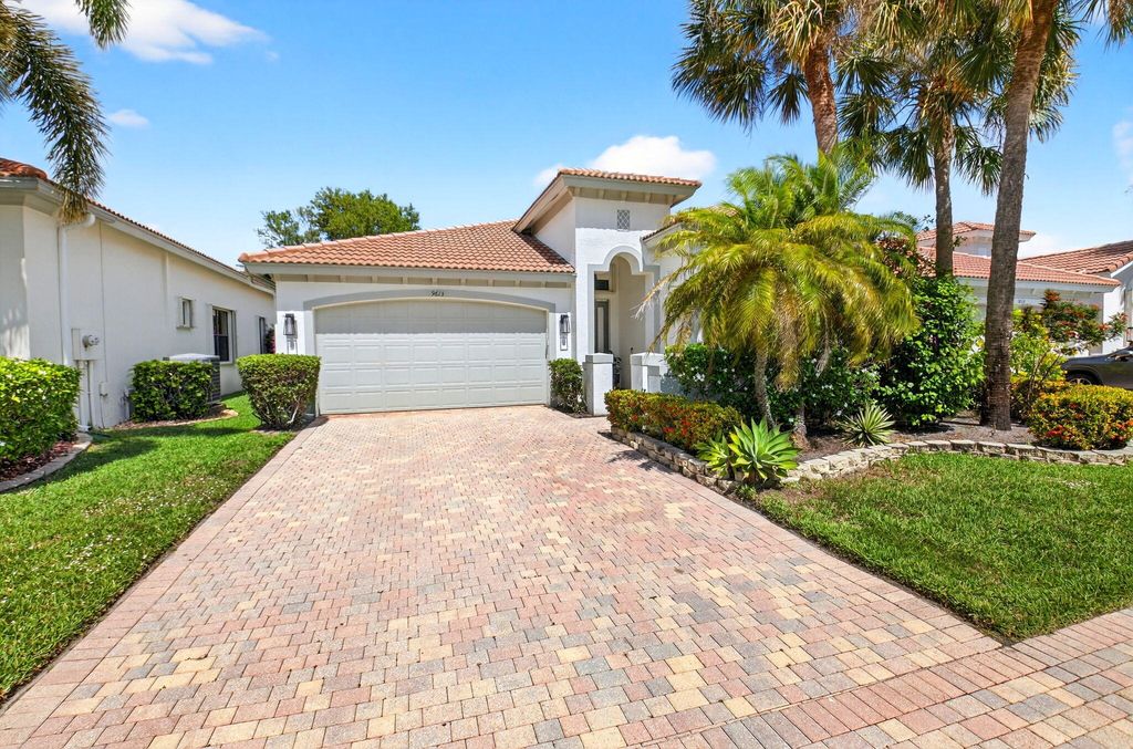 Photo of 9613 Isles Cay Drive, Delray Beach, FL 33446 (MLS # B26001959)