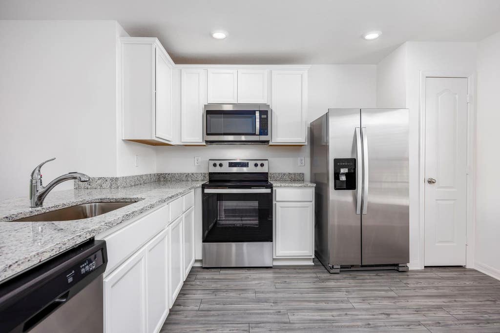 Photo of 375 SW Dwight Avenue, Port Saint Lucie, FL 34983 (MLS # B26061667)