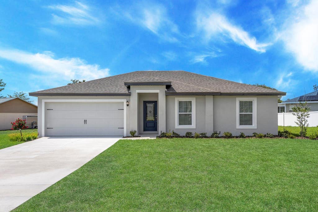 Photo of 375 SW Dwight Avenue, Port Saint Lucie, FL 34983 (MLS # B26061667)