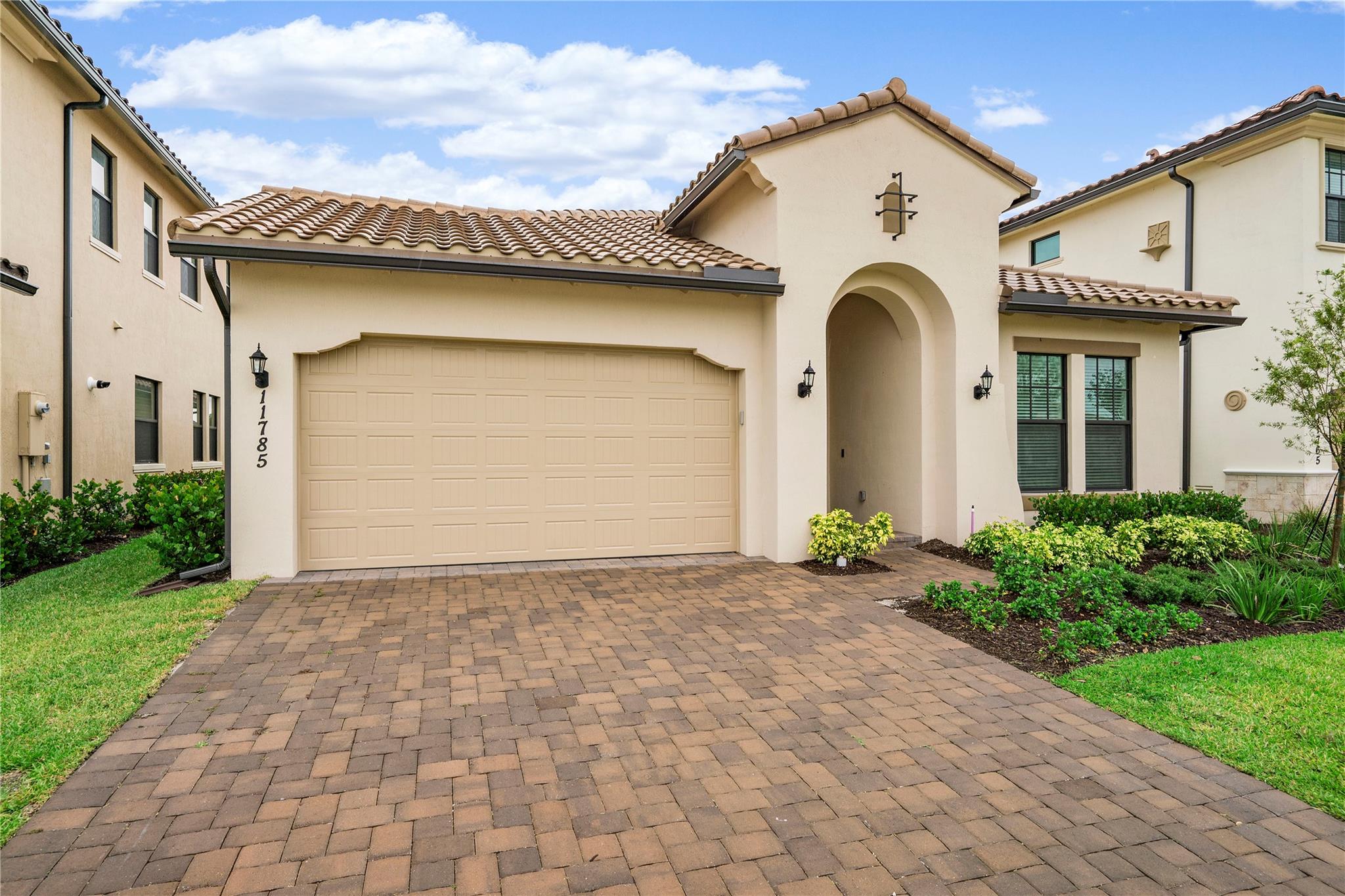 This beautiful home is located in one of Parkland's most sought after family communities! Features include a foyer entrance, a spacious open floor plan, great room, a huge center island in the kitchen, 4 bedrooms, 3.5 bathrooms, tray ceilings, impact glass windows, a covered patio and a huge yard! Parkland Bay has amazing amenities which, include a 24 hour guard gated entrance, great area schools, a resort style clubhouse, fitness center, basketball and tennis courts, play area & a stunning community pool! This is South Florida Living at its best!