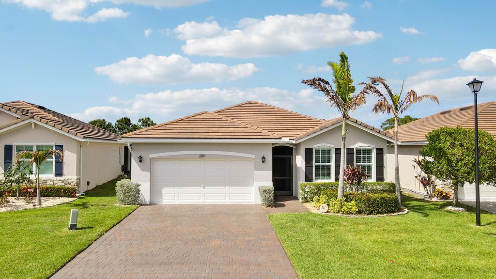 Photo of 2011 NW Golden Oak Trail, Jensen Beach, FL 34957 (MLS # B26019151)