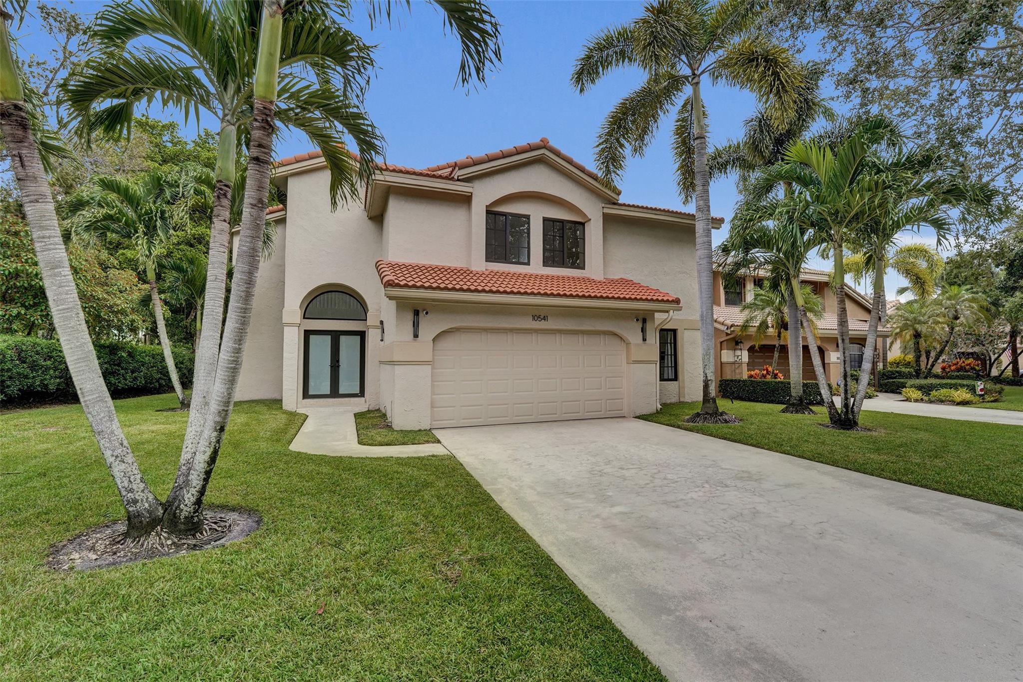 This 4-bedroom, 3-bathroom home is the perfect blend of comfort, style, and peace of mind. There are thoughtful upgrades throughout, including fully remodeled bathrooms, a new roof, a new garage door, and a new garage door opener — all to ensure the home is as reliable as it is beautiful. For added security and comfort, the house is equipped with hurricane-impact windows and doors, as well as a monitored alarm system, providing peace of mind whether you're home or away. One of the great outdoor features is the private pool overlooking the lake — it’s peaceful, scenic, and the perfect spot to relax or entertain. From morning coffee by the water to sunset swims, the backyard has always been a favorite retreat. The neighborhood is quiet, welcoming, and conveniently located.