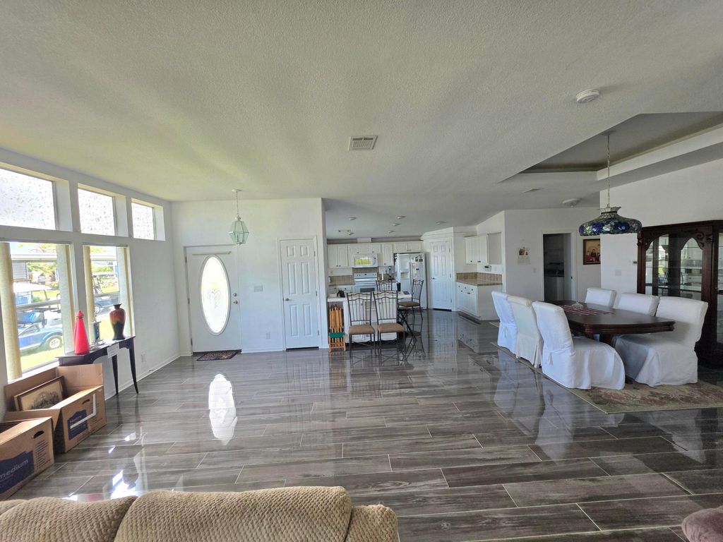 Photo of 8027 9th Hole Drive, Port Saint Lucie, FL 34952 (MLS # B26018181)