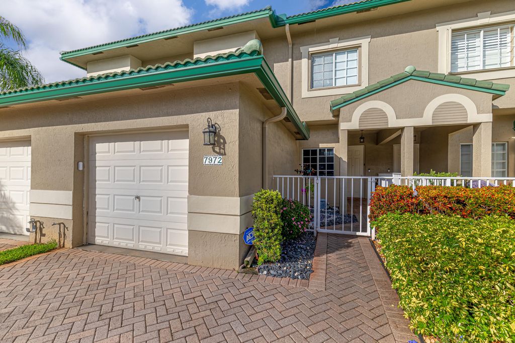 Photo of 7972 W Exeter Blvd Blvd W #101, Tamarac, FL 33321 (MLS # B26022599)