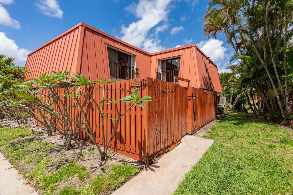 Photo of 3229 Gardens East Drive #B, Palm Beach Gardens, FL 33410 (MLS # B26011839)