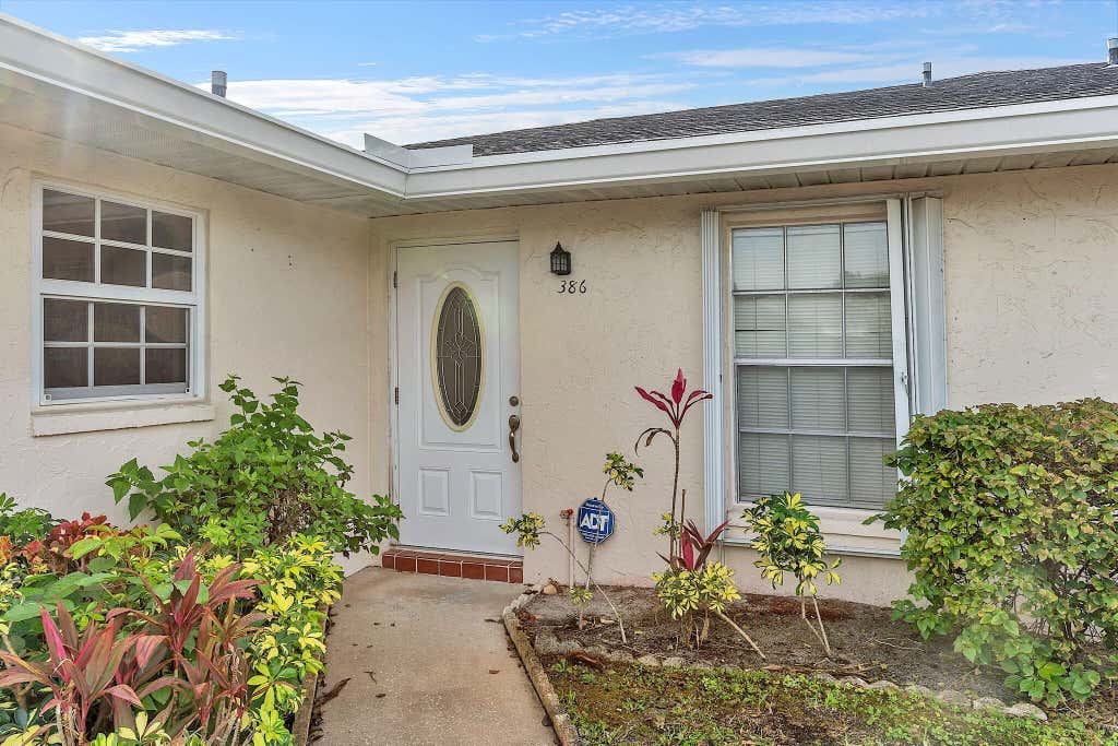 Photo of 386 Bennington Lane, Lake Worth, FL 33467 (MLS # R10954488)