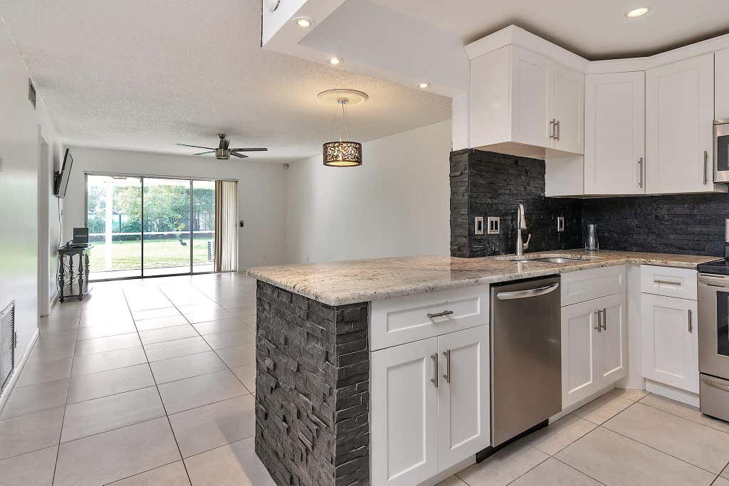Photo of 386 Bennington Lane, Lake Worth, FL 33467 (MLS # R10954488)