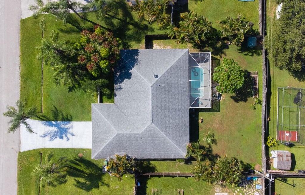 Photo of 620 SW Cynthia Street, Port Saint Lucie, FL 34983 (MLS # R10960024)