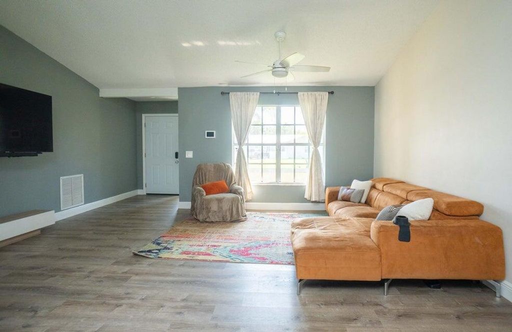 Photo of 620 SW Cynthia Street, Port Saint Lucie, FL 34983 (MLS # R10960024)