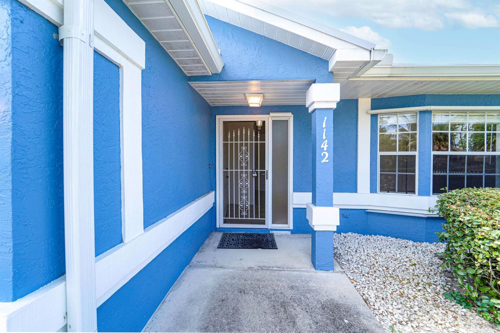 Photo of 1142 SW Dalton Avenue, Port Saint Lucie, FL 34953 (MLS # R11087484)