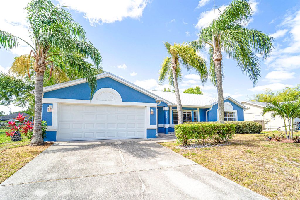 Photo of 1142 SW Dalton Avenue, Port Saint Lucie, FL 34953 (MLS # R11087484)