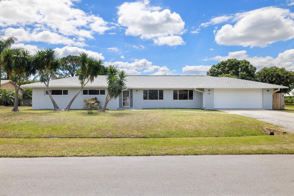 Photo of 2171 SE Gidding Road, Port Saint Lucie, FL 34952 (MLS # R10976699)