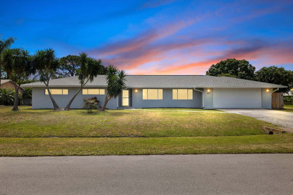 Photo of 2171 SE Gidding Road, Port Saint Lucie, FL 34952 (MLS # R10976699)
