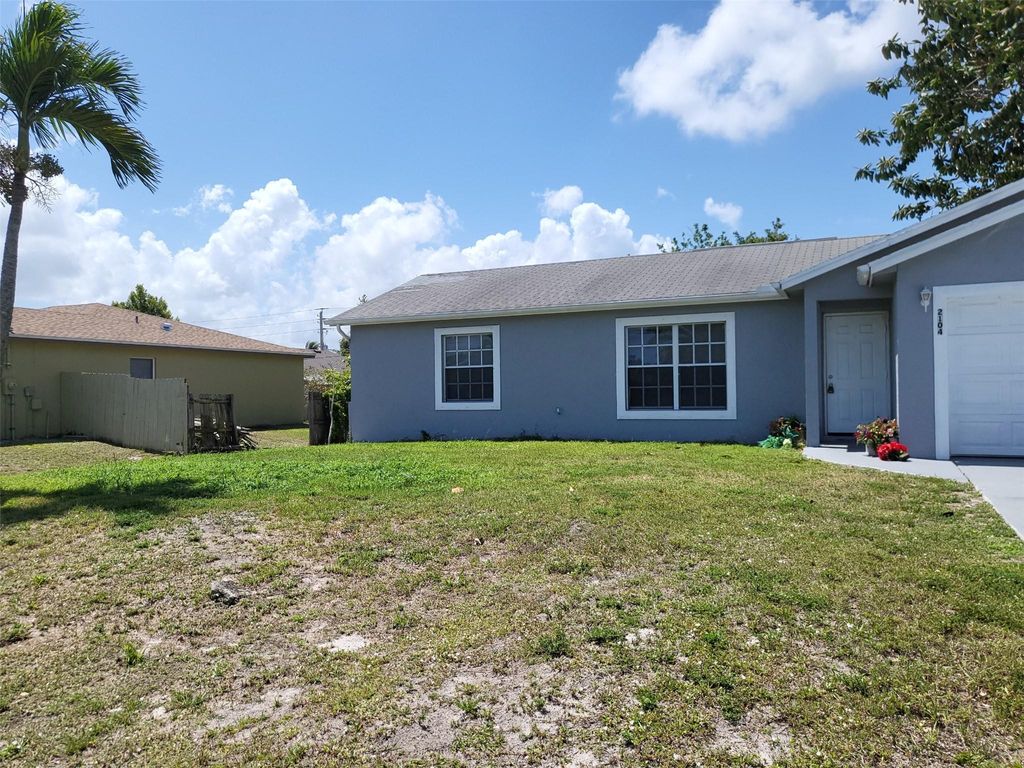 Photo of 2104 SE Stargrass Street, Port Saint Lucie, FL 34984 (MLS # F10496043)