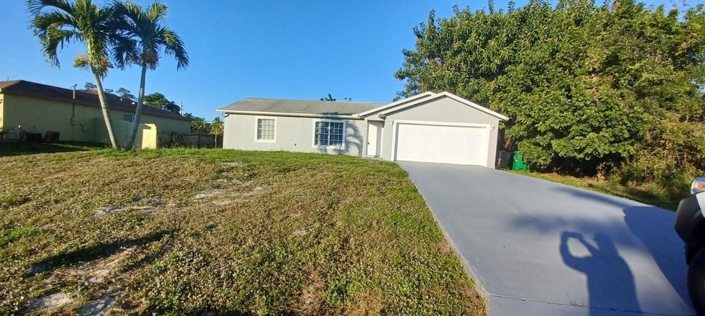 Photo of 2104 SE Stargrass Street, Port Saint Lucie, FL 34984 (MLS # F10496043)