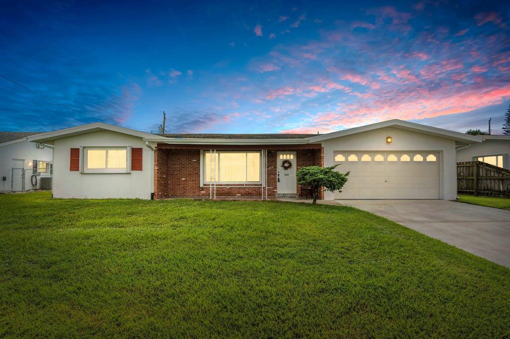 This CBS home in Port Saint Lucie is a true gem that has been impeccably maintained by its proud owner for over three decades. With its attractive county taxes, and prime location, it presents a remarkable opportunity for those seeking a comfortable and well-cared-for home in a delightful neighborhood. The interior of the home has a spacious layout, providing ample living space for comfort and convenience. The well-designed floor plan encompasses multiple living areas, with large windows throughout that flood the rooms with natural light. The kitchen showcases a timeless design with modern appliances, and a breakfast nook. Stepping outside, the well-maintained backyard is an oasis of tranquility, providing a private sanctuary for relaxation and outdoor enjoyment.