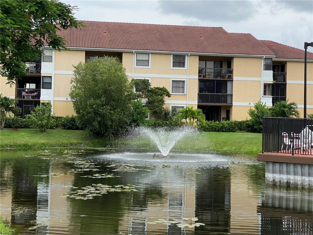 Photo of 5701 Riverside Dr #104B6, Coral Springs, FL 33067 (MLS # F10292439)