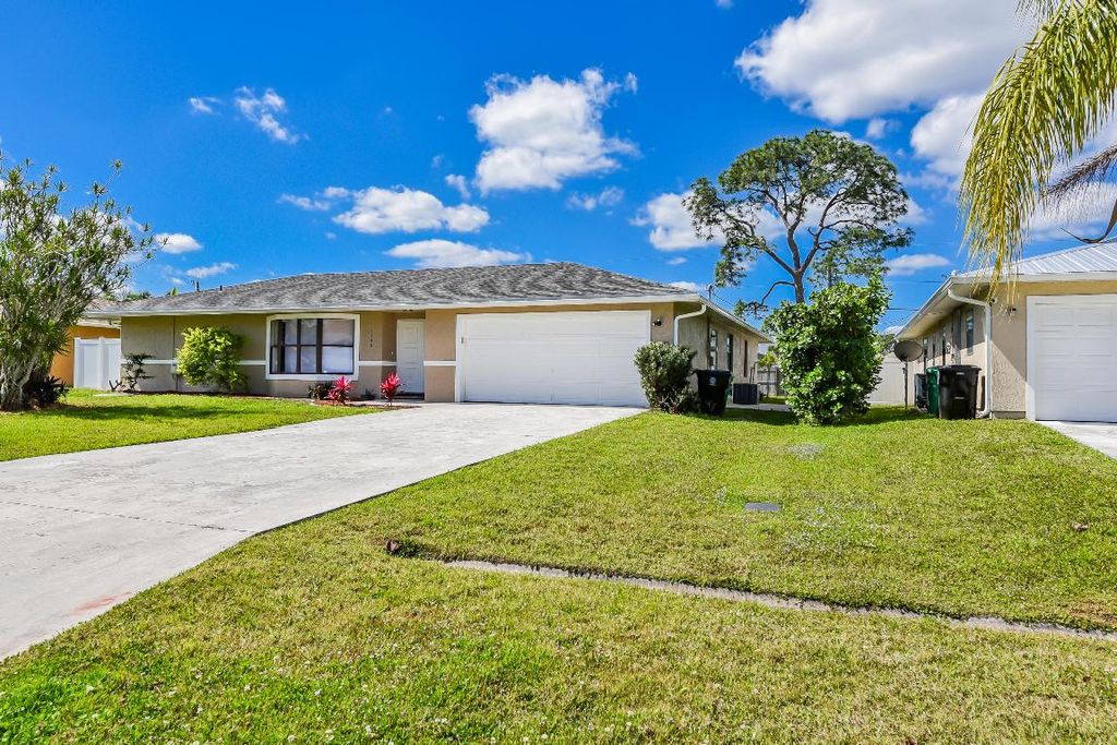 Photo of 1168 SE Clifton Lane, Port Saint Lucie, FL 34983 (MLS # R10971211)