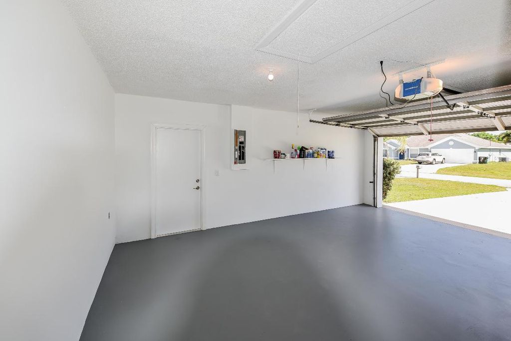 Photo of 1168 SE Clifton Lane, Port Saint Lucie, FL 34983 (MLS # R10971211)