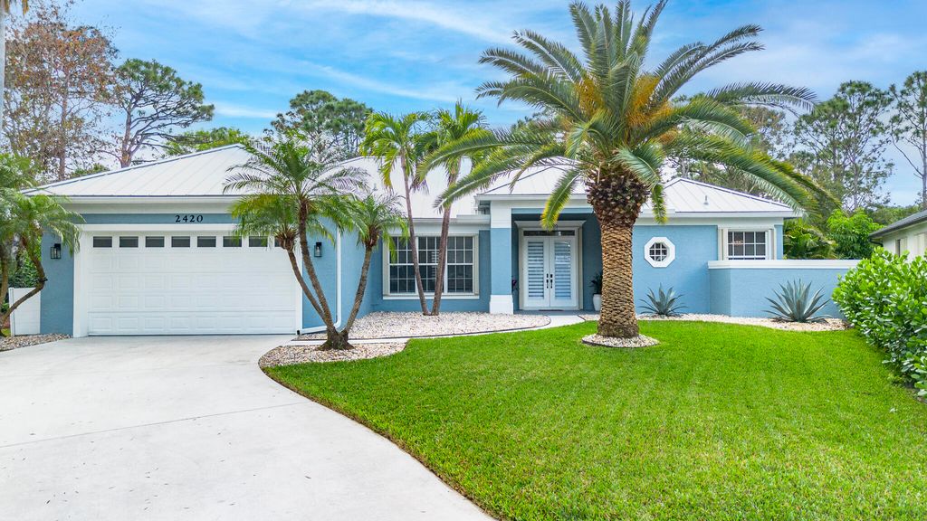 Photo of 2420 SW Carriage Place, Palm City, FL 34990 (MLS # R11060480)