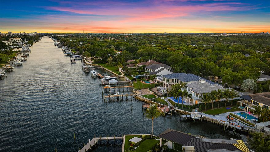 Experience premier Intracoastal living, this property offers wide water views, no fixed bridges and hard-to-find dockage accommodating multiple deep-water vessels, including a sportfish yacht and center console. Set within a no-wake zone and featuring direct ocean access just minutes from Palm Beach Inlet, this home is a dream for boating and waterfront enthusiasts. Coveted eastern exposure delivers stunning sunrises and cool afternoons. Meticulously maintained and thoughtfully updated, the existing home includes soaring ceilings, five ensuite bedrooms, private office with water views, and a 3-car garage. This is a great value to enjoy the existing house, or build new! Close to world-class golf, dining, and the best of the Palm Beach lifestyle.