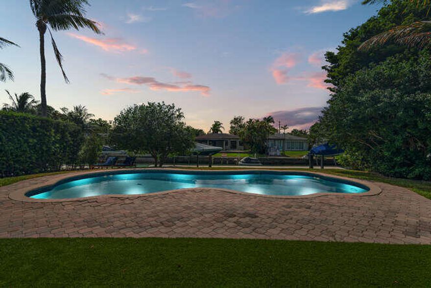 Gorgeous remodeled waterfront home. Private gated and a short walk  to the beach. Th perfect boating, jet skiing, and paddle boarding home with lots of room for entertaining. Ocean access with no fixed bridges =, with allowance for a 40ft boat.
You can not beat this location and high elevation lot walking distance to The Lehrman school and a stones throw away to The Four Seasons Surfside and Bal Harbor Shops a 5 minute drive away. 
A must see@ Totally remodeled with master permits in 2020, also room to expand.