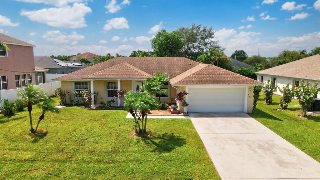 Photo of 5710 NW Zenith Drive, Port St Lucie, FL 34986 (MLS # R10912773)