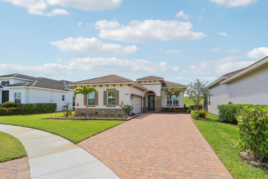 Photo of 9247 SW Miracoli Way, Port Saint Lucie, FL 34987 (MLS # B26026933)