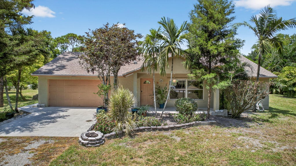 Photo of 16971 W Mayfair Drive W, The Acreage, FL 33470 (MLS # B26083505)