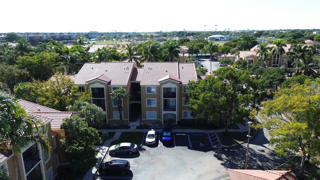 Photo of 8000 N Nob Hill Road #202, Tamarac, FL 33321 (MLS # F10531618)