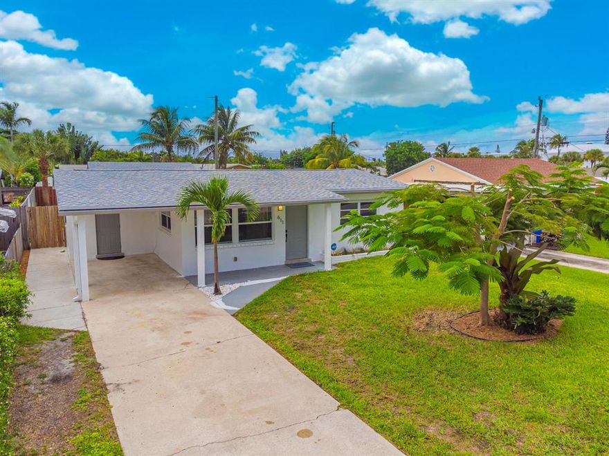 Bring Your Boat or Jet Ski! Beautiful Remodeled Single Family Home offers 2 Bedroom, 2 Bath, Carport & 25'x15' Workshop/Shed with a roll up door and located on a Quiet Street with NO HOA in Lantana. Located 3 Blocks from the Sportsman Park/ Boat Ramp, the Bicentennial Intracoastal Park, Lots of Restaurants, Shops & the Beach! The Eat-In Kitchen has New White Cabinets, Granite counters and Brand New Stainless Steel Appliances. Charming Terrazzo floors throughout, New Freshly Painted Knockdown Walls & Ceilings, two Updated Bathrooms & W/D, compliment this home and New Roofs. Relax in your Covered Screened Patio & Enjoy BBQ's in Lush Green Fully Fenced Backyard and shutter for hurricane protection.