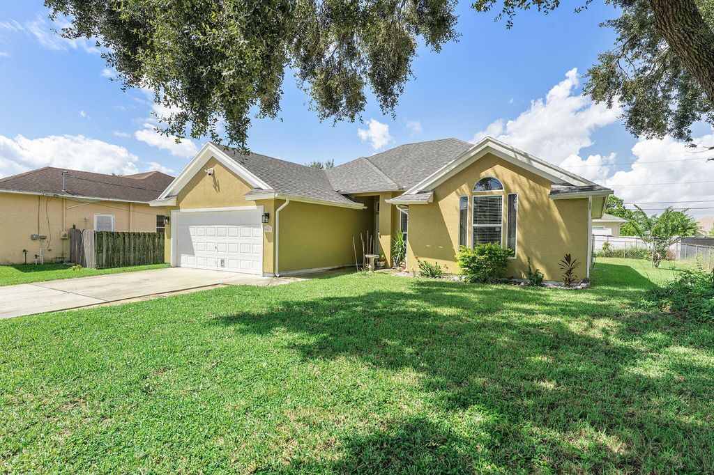 Photo of 1622 SW Realty Street, Port Saint Lucie, FL 34987 (MLS # B26011912)