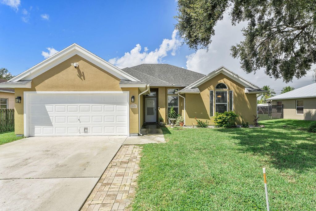 Photo of 1622 SW Realty Street, Port Saint Lucie, FL 34987 (MLS # B26011912)