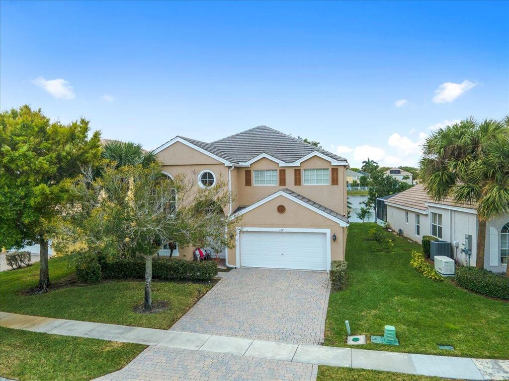 Photo of 107 Kensington Way, Royal Palm Beach, FL 33414 (MLS # R10773540)