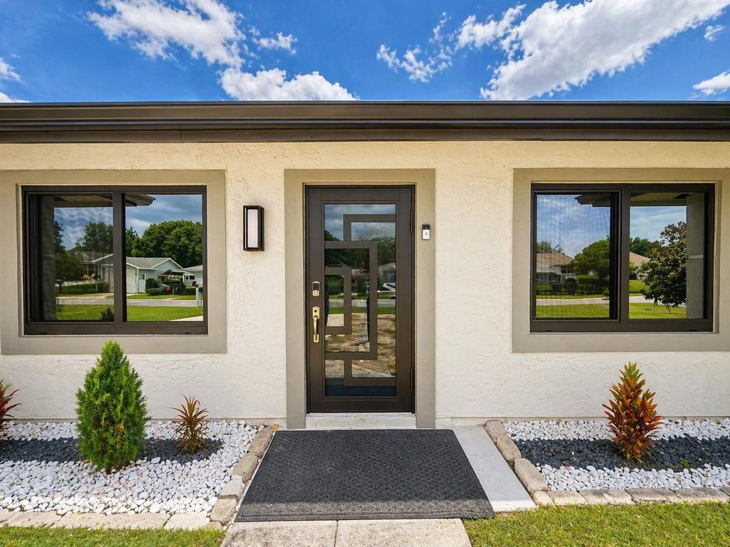 Photo of 568 SE Chapman Avenue, Port Saint Lucie, FL 34984 (MLS # B26023096)