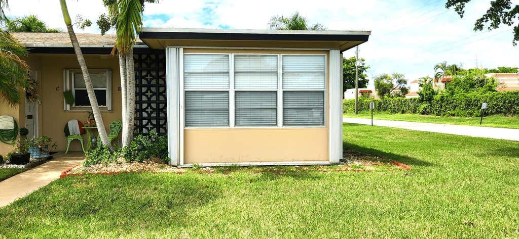 Photo of 1042 NORTH Drive #D, Delray Beach, FL 33445 (MLS # B26065270)