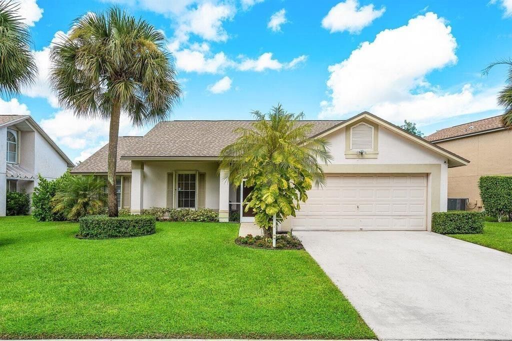Photo of 3598 Woods Walk Boulevard, Lake Worth, FL 33467 (MLS # F10530226)