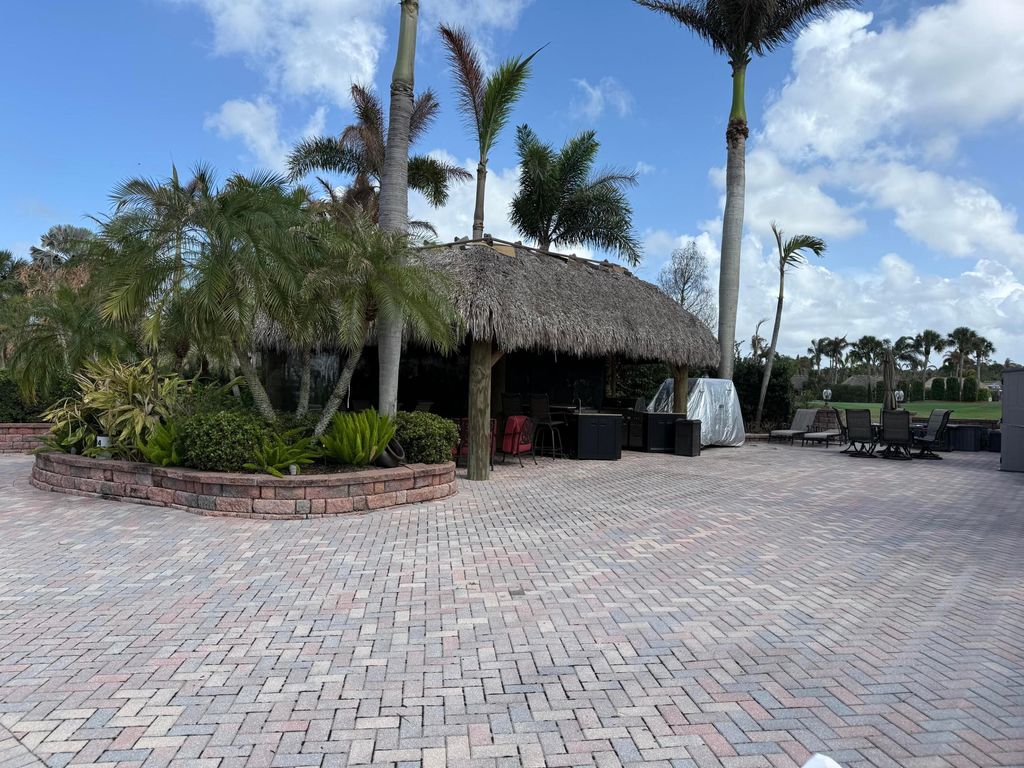 Photo of 424 NW Chipshot Lane, Port Saint Lucie, FL 34986 (MLS # B26010869)