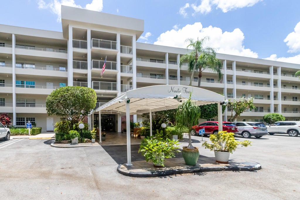 Photo of 808 Cypress Boulevard #106, Pompano Beach, FL 33069 (MLS # B26092200)