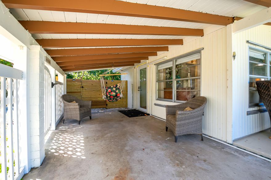 Hidden gem in Lantana.  Close to the ocean, boat ramp, restaurants but still have the beautiful tree shaded back garden.  Two driveways, gas hot water and set up available for gas stove.  Electric stove now.  Needs to be seen to appreciate.  This listing is also for rent $3100