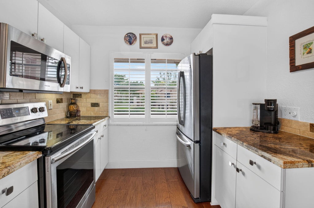 Photo of 9259 VISTA DEL LAGO #18D, Boca Raton, FL 33428 (MLS # B26090801)