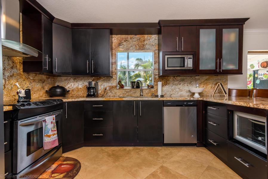 This is a light and bright spacious 3 bedroom2 bath pool house with a HUGE FENCED IN YARD, an outside kitchen, large bedrooms in the desirable Boca Raton with A rated schools is for rent for only $3000 which includes your monthly pool maintenance. House has a new kitchen and appliances and built in closets in all of the bedrooms.No application process. First, last and security, proof of income, a descent credit score is all you need to move into this house right away. House does have a garage and a large driveway to fit 4 cars easy. Pets are welcome with a pet deposit. NEW AC, NEW Appliances, NEW pool liner