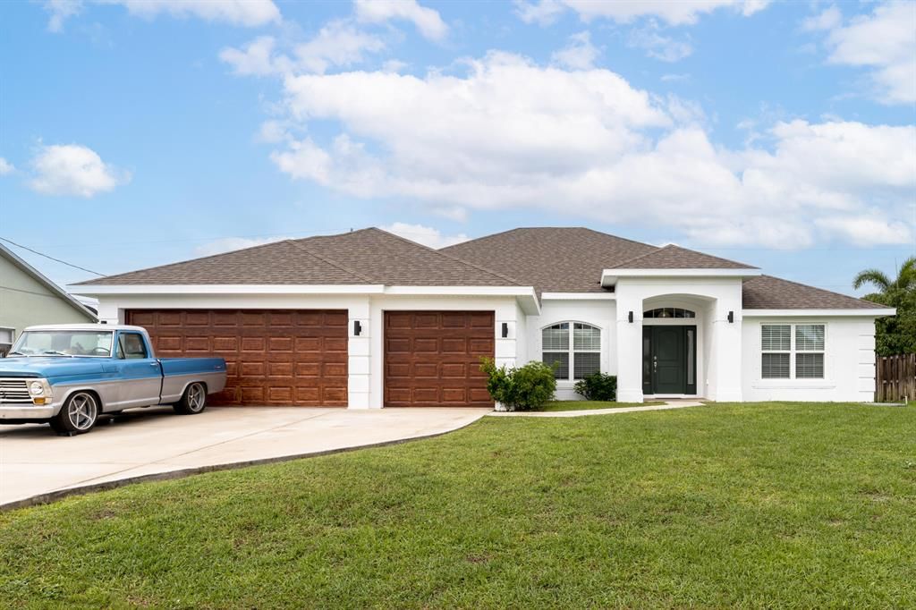 Photo of 4042 SW Cheribon Street, Port Saint Lucie, FL 34953 (MLS # R10838248)