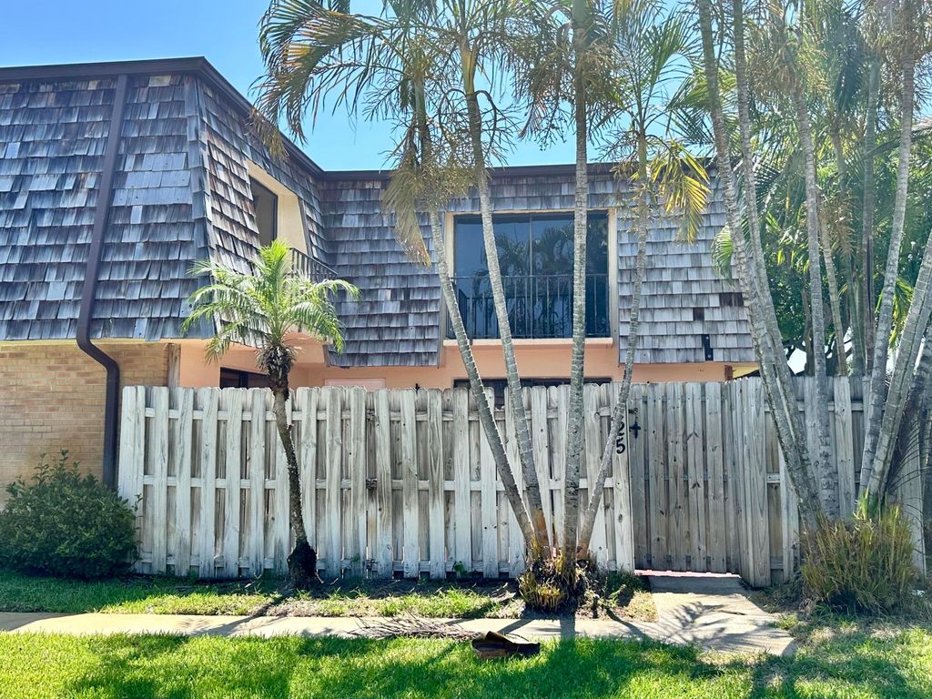 Photo of 225 Lake Arbor Drive, Palm Springs, FL 33461 (MLS # R10993114)