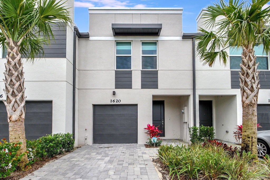 Photo of 1620 Lindley Street, Mangonia Park, FL 33407 (MLS # B26044759)