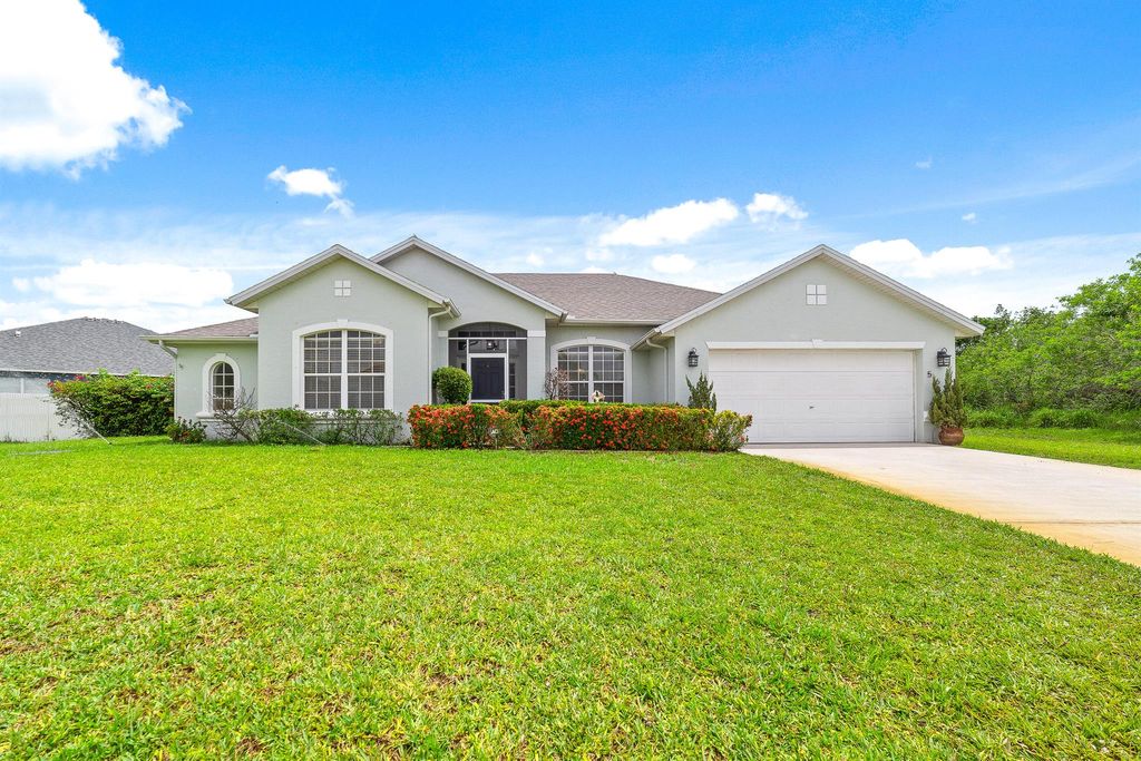 Photo of 563 SW Crawfish Drive, Port St Lucie, FL 34953 (MLS # R10895317)