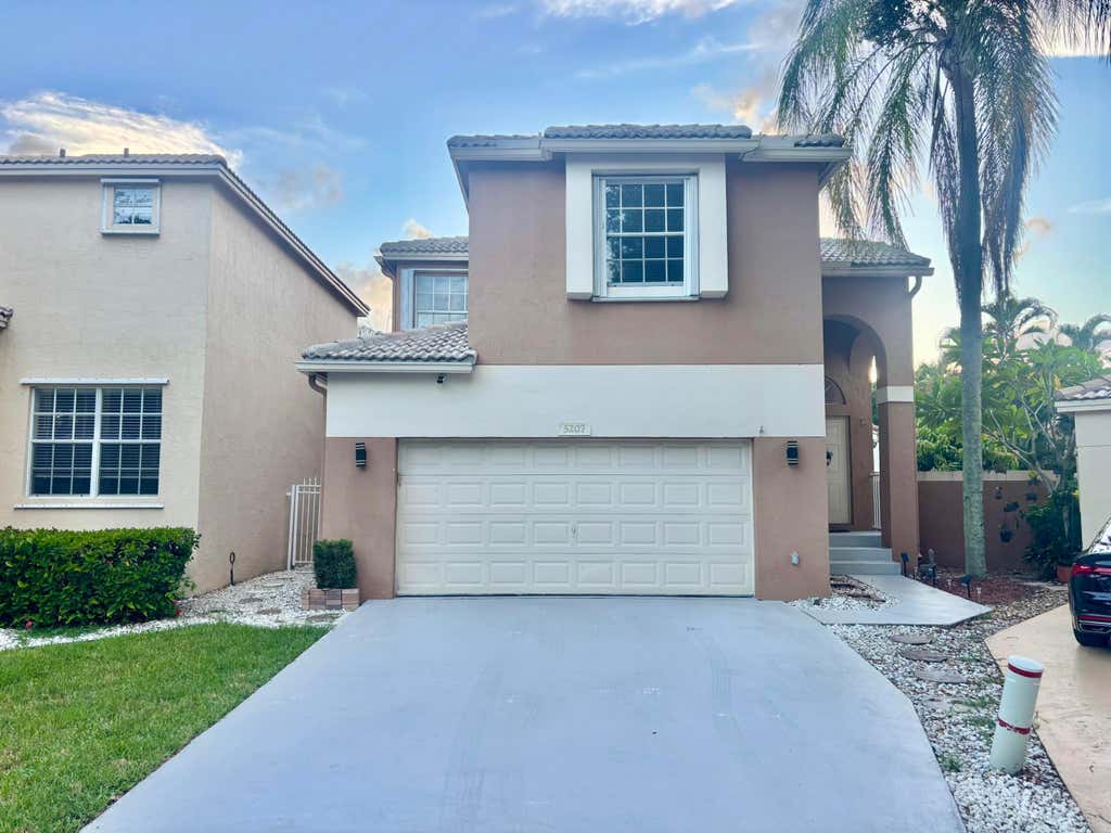 Photo of 5207 Eagle Cay Place, Coconut Creek, FL 33073 (MLS # B26068547)